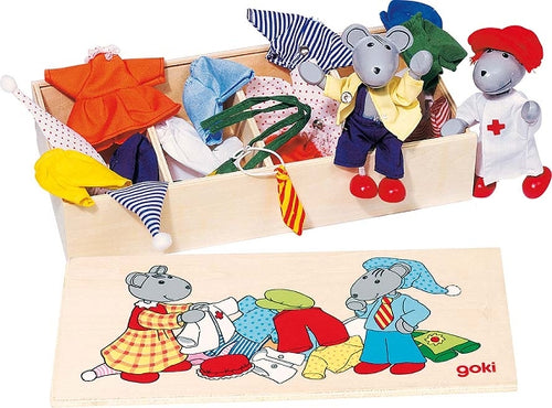 Set of toy mice with clothing and accessories on a wooden board, featuring the brand 'goki'.
