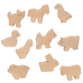 Set of wooden animal toys on a white background