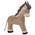 Wooden donkey toy with a rope on a white background