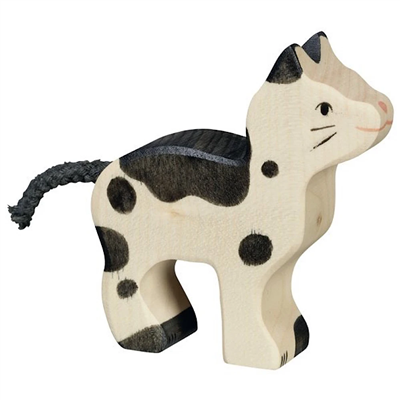 Wooden cat figurine with black spots on a white background