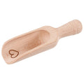 Wooden scoop with a heart engraving on a white background
