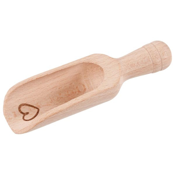 Wooden scoop with a heart engraving on a white background