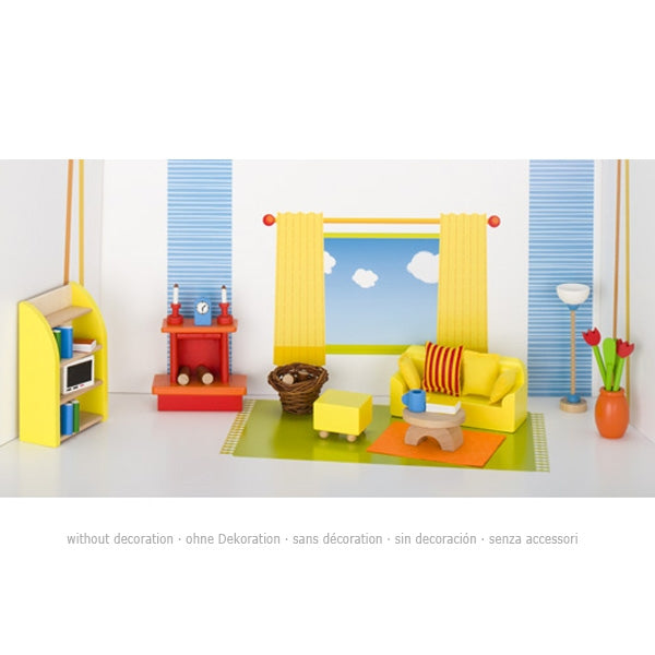 Colorful toy living room set with furniture and decor on a white background
