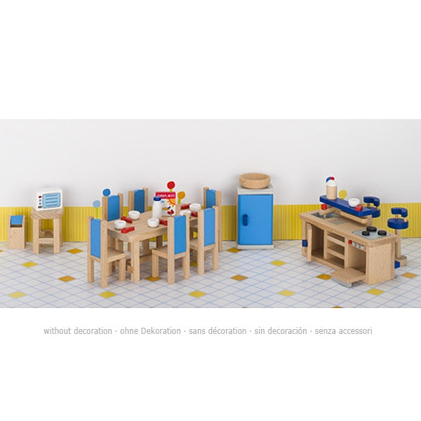 Children's play kitchen set with furniture and accessories on a tiled floor.