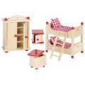 Set of wooden dollhouse furniture including a bed, cabinet, and table on a white background