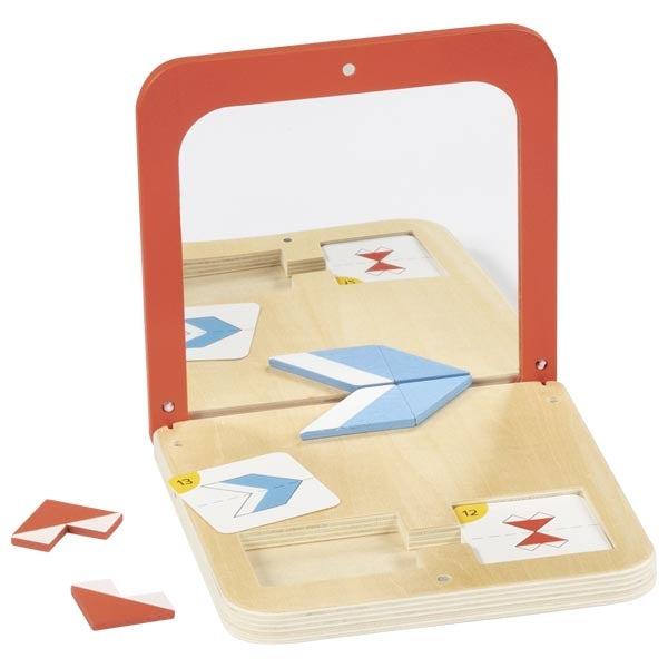 Wooden puzzle with geometric shapes and cards in a red and beige box on a white background