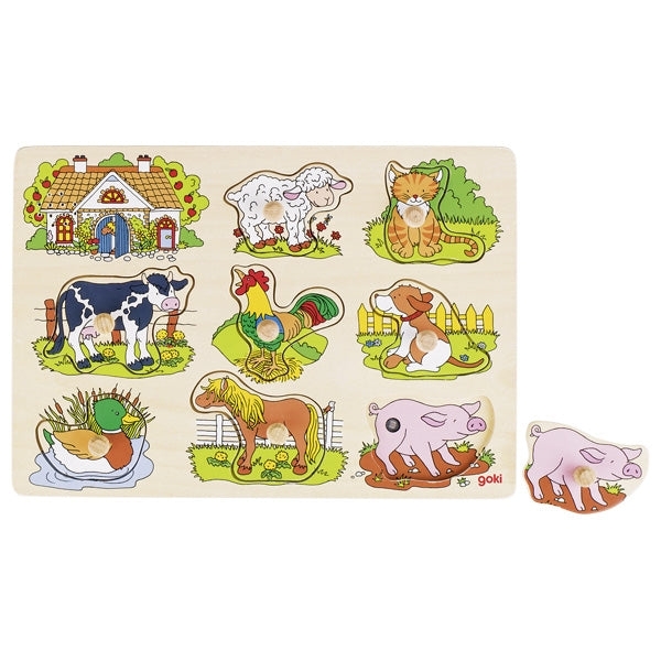 Wooden puzzle with farm animal illustrations on a white background