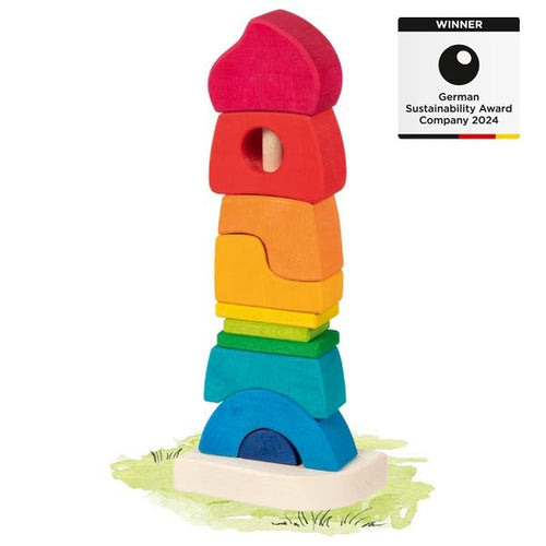 Colorful stack of wooden blocks with a 'Winner' label for German Sustainability Award Company 2024 on a white background.
