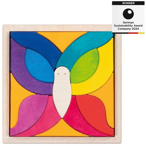 Colorful butterfly puzzle with wooden frame and 'Winner' label for German Sustainability Award Company 2024.
