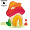 Colorful wooden toy house with a gnome on a white background, featuring the German Sustainability Award 2024.