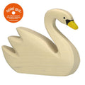 White swan figurine on a white background