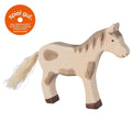 Wooden horse toy with brown patches and a white background, featuring the 'spiel gut' logo.