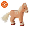 Wooden horse toy with a white mane and tail on a white background