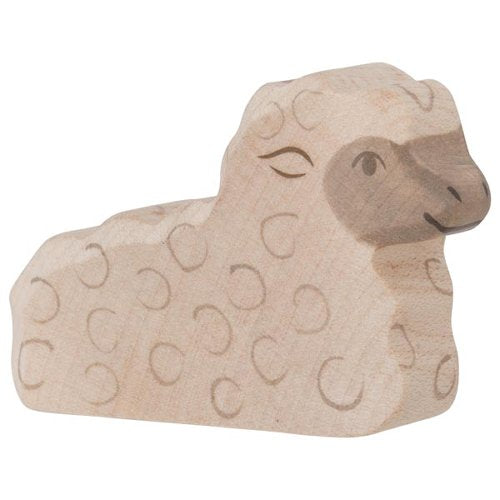 Wooden sheep figure on a white background