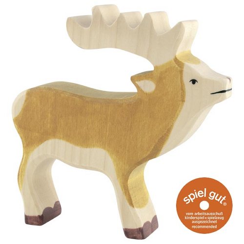Wooden deer figure on a white background