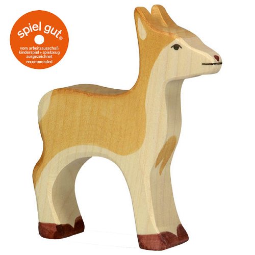 Wooden deer figure on a white background