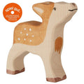 Wooden deer figurine on a white background