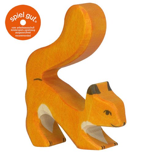 Wooden squirrel figurine on a white background