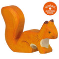 Wooden squirrel figurine on a white background