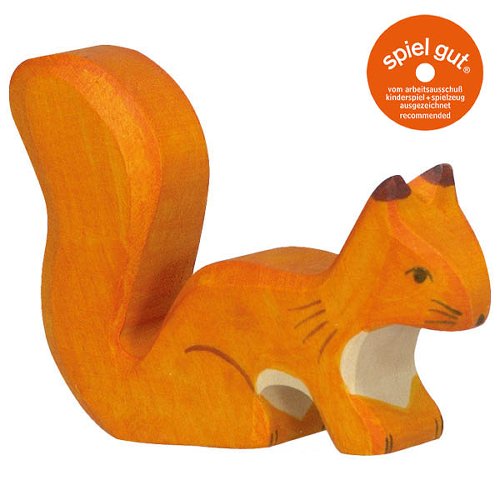 Wooden squirrel figurine on a white background