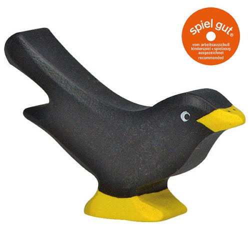 Black and yellow bird-shaped object on a white background