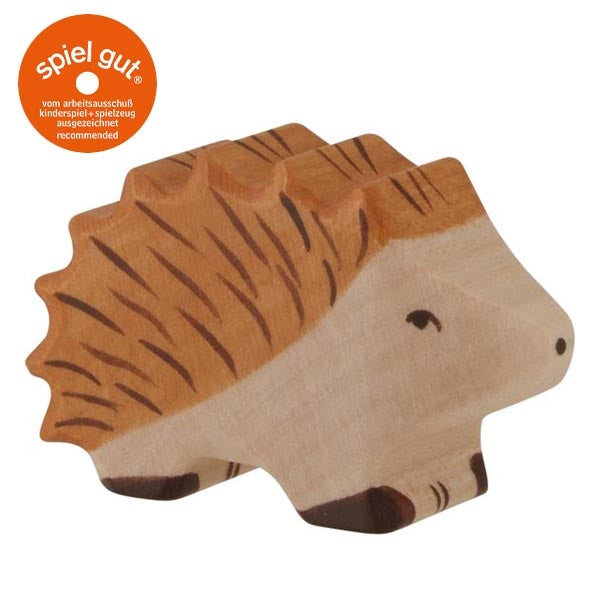 Wooden hedgehog toy with 'spiel gut' logo on a white background