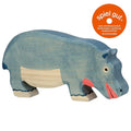 Wooden hippo toy with 'spiel gut' certification logo on a white background