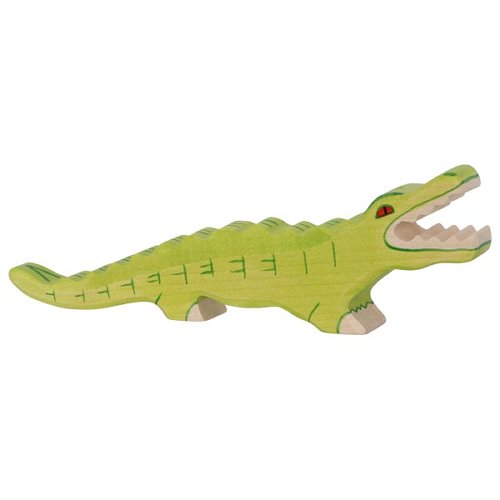 Green toy alligator on a white background