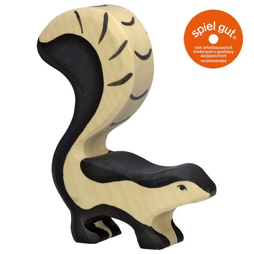 Wooden toy skunk with 'spiel gut' label on a white background