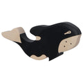 Black and white orca-shaped toy on a white background