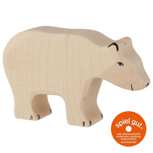 White polar bear figurine on a white background