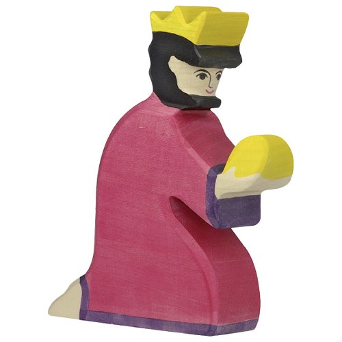 Wooden figurine of a character in a pink dress with a yellow hat on a white background