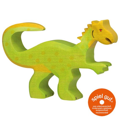 Green dinosaur toy figure on a white background