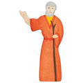 Figurine of a person in an orange robe with a white background