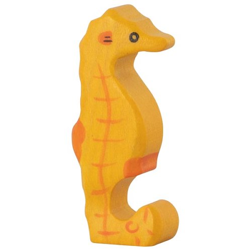 Yellow wooden seahorse toy on a white background
