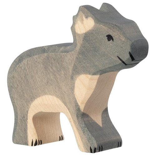 Wooden toy koala bear figure on a white background
