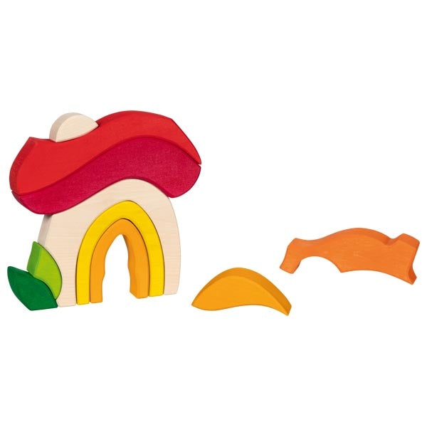 Colorful wooden toy with a red roof, yellow arch, green leaves, and orange wave on a white background
