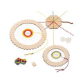 Wooden weaving reels with colorful yarn on a white background