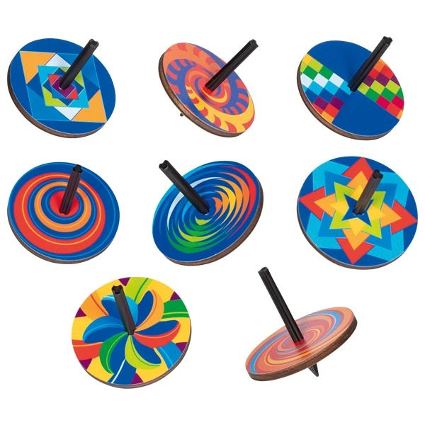 Set of colorful wooden spinning tops on a white background