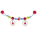 Colorful baby pram toy with beads and rings on a white background