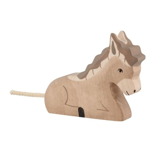 Wooden horse toy on a white background